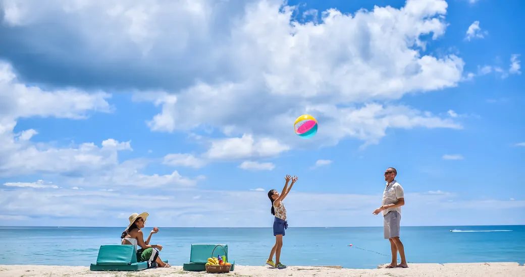 Family time on the beach near Laguna Phuket
